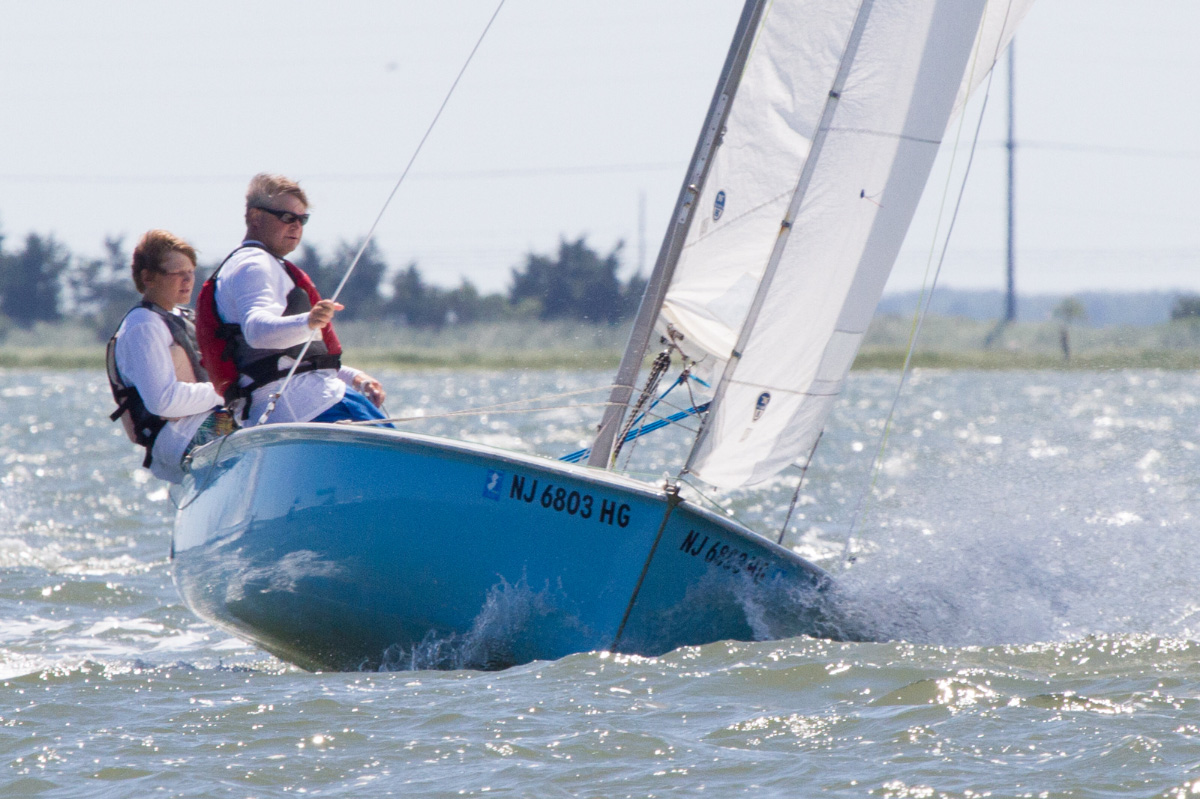two-people-sailing-blue-dinghy-ADULT-SAILING-Avalon-Yacht-Club