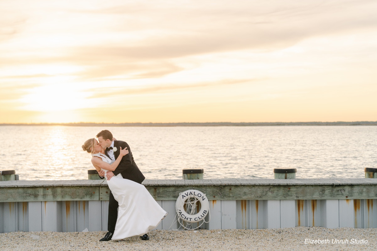 beach-wedding-kiss-sunset-WEDDING-&-EVENTS-Outside-Sunset-Avalon-Yacht-Club