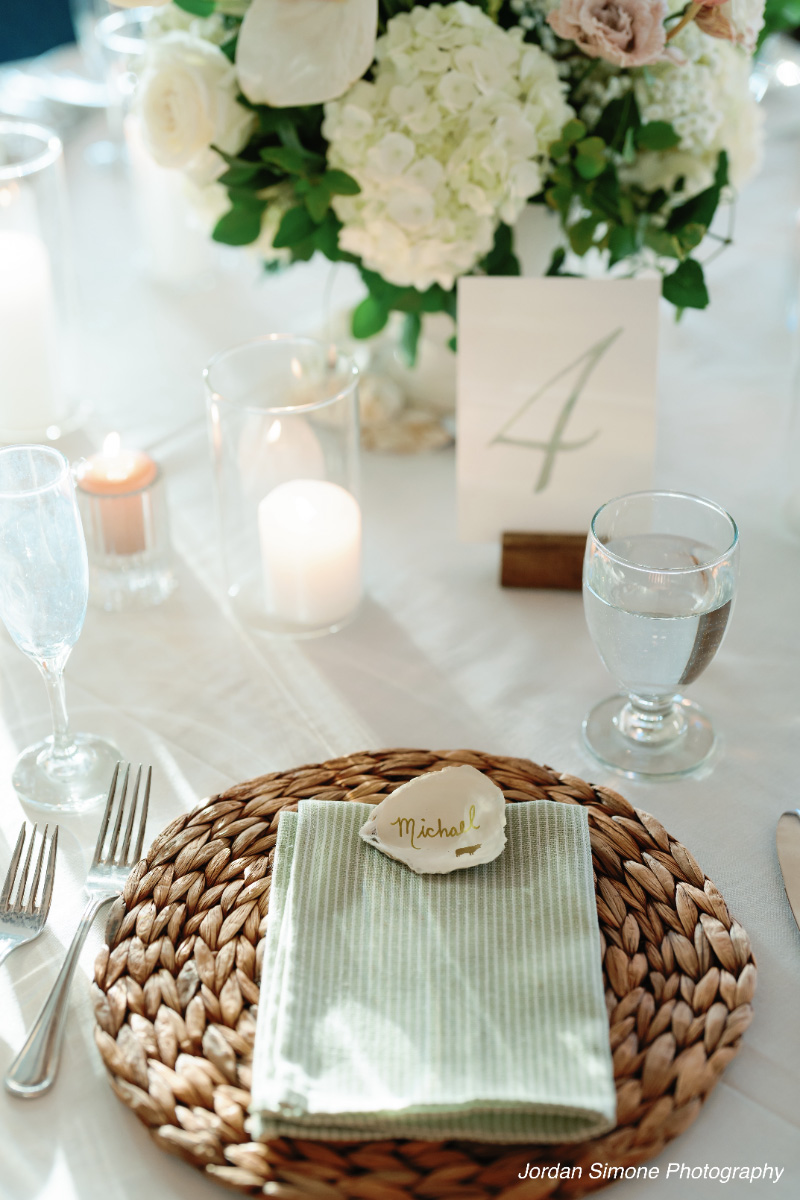 Wedding-table-setting-with-floral-arrangement-WEDDING-&-EVENTS-Ballroom-Table-decor-Avalon-Yacht-Clu